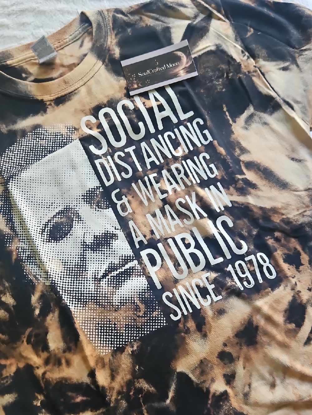 Acid Wash Bleached Graphic Tee with Bold White Text